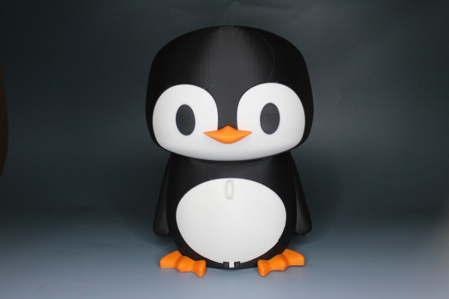 Penguin Headset and Earbud Holder