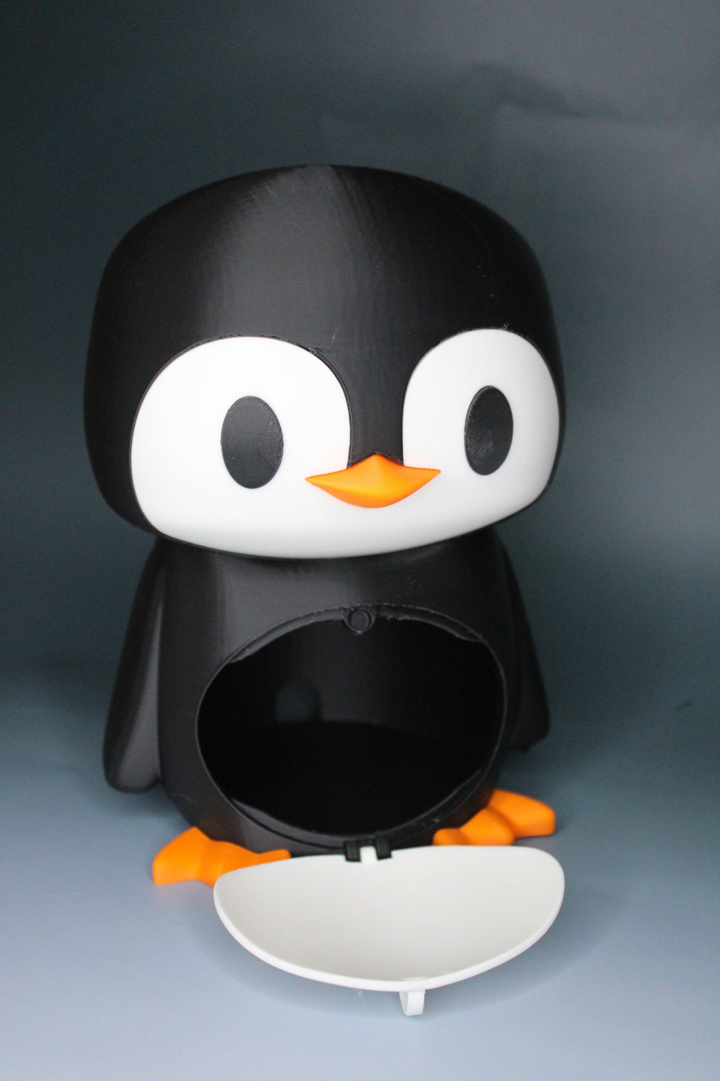 Penguin Headset and Earbud Holder