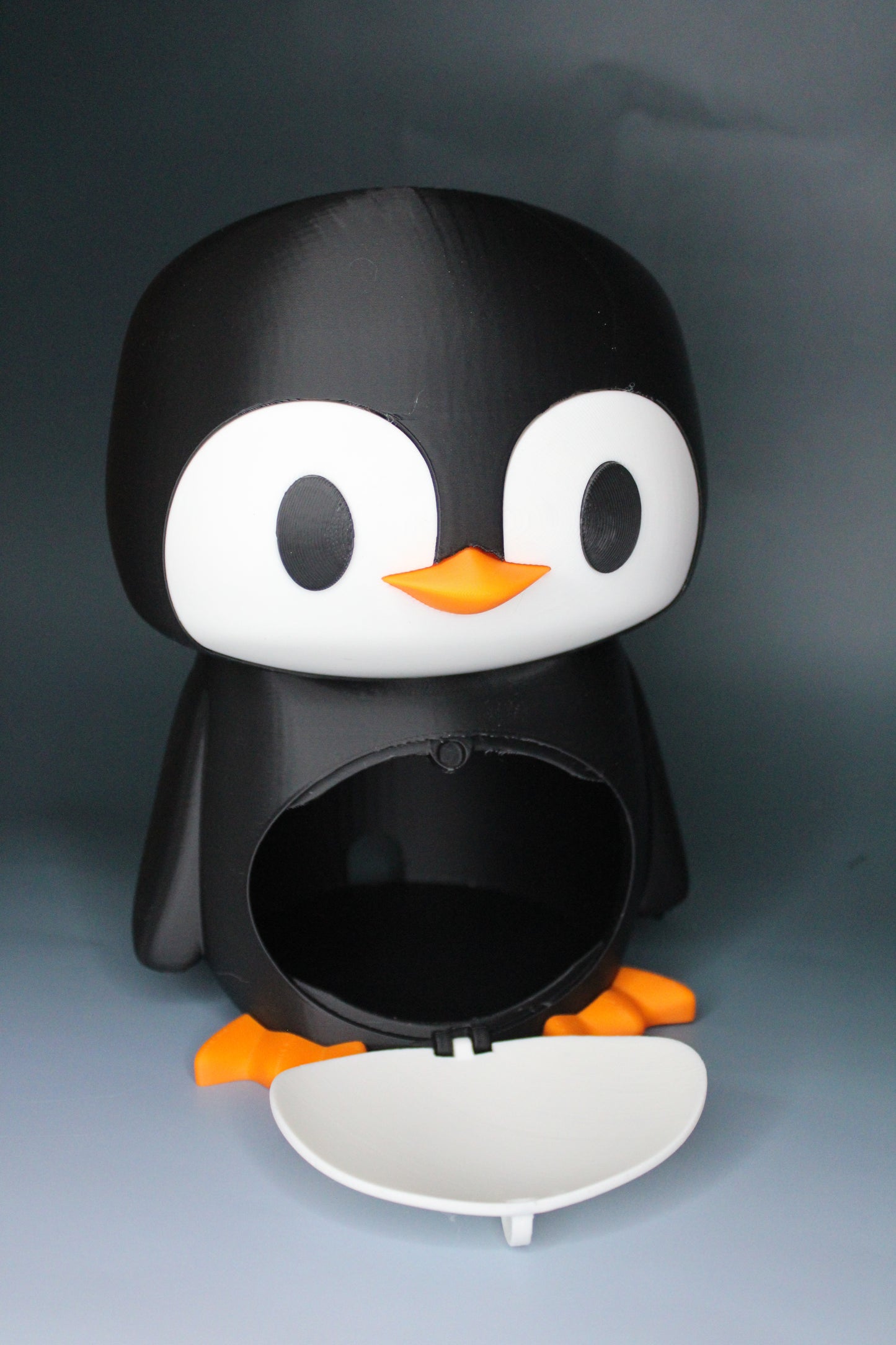 Penguin Headset and Earbud Holder