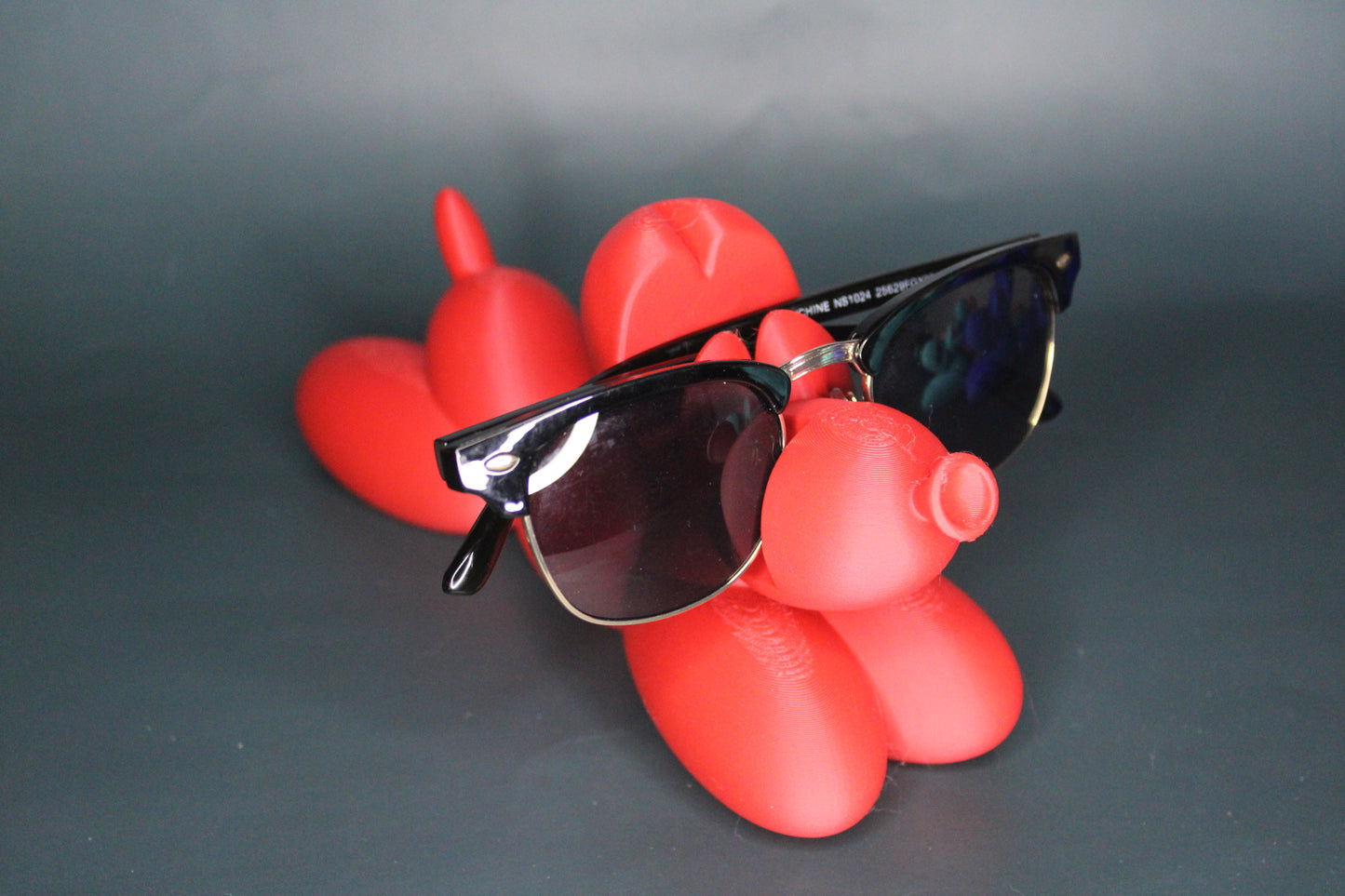 Laying Balloon Dog Eye Glass Holder