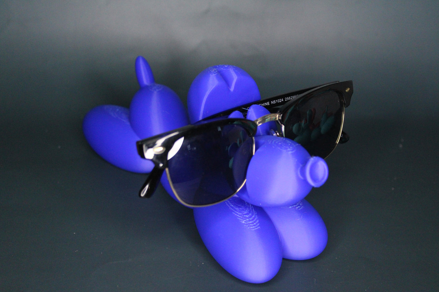 Laying Balloon Dog Eye Glass Holder