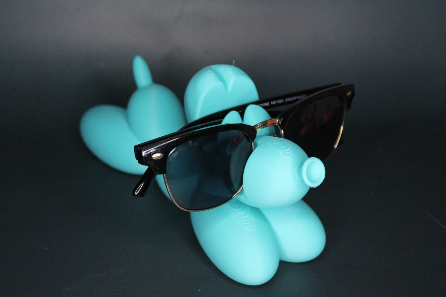 Laying Balloon Dog Eye Glass Holder